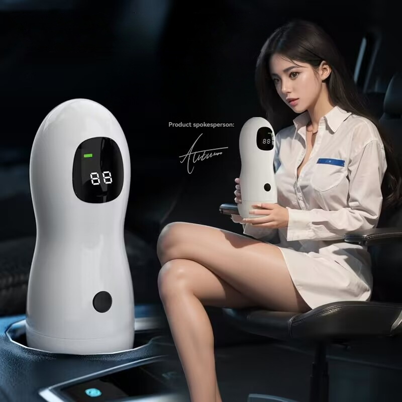 Young woman in car with modern gadget, blending style and technology in an elegant setting.