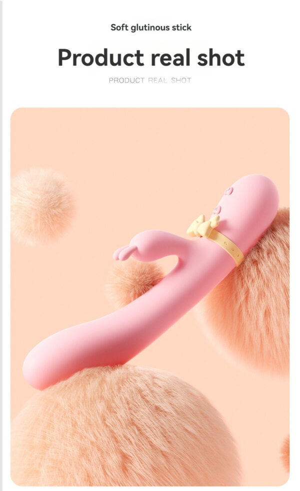 Cute pink glutinous stick with bow, featured on fluffy background for playful appeal.