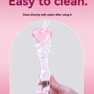 Elegant pink heart-shaped glass toy, easy to clean and ergonomically designed for pleasure.