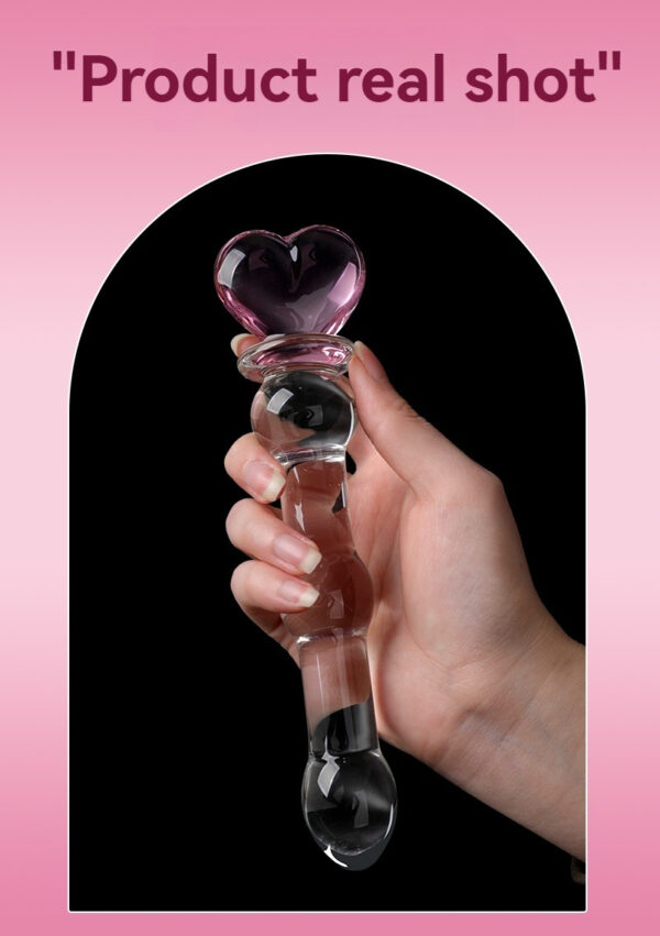 Elegant heart-shaped glass toy in pink and violet, designed for intimacy and pleasure.