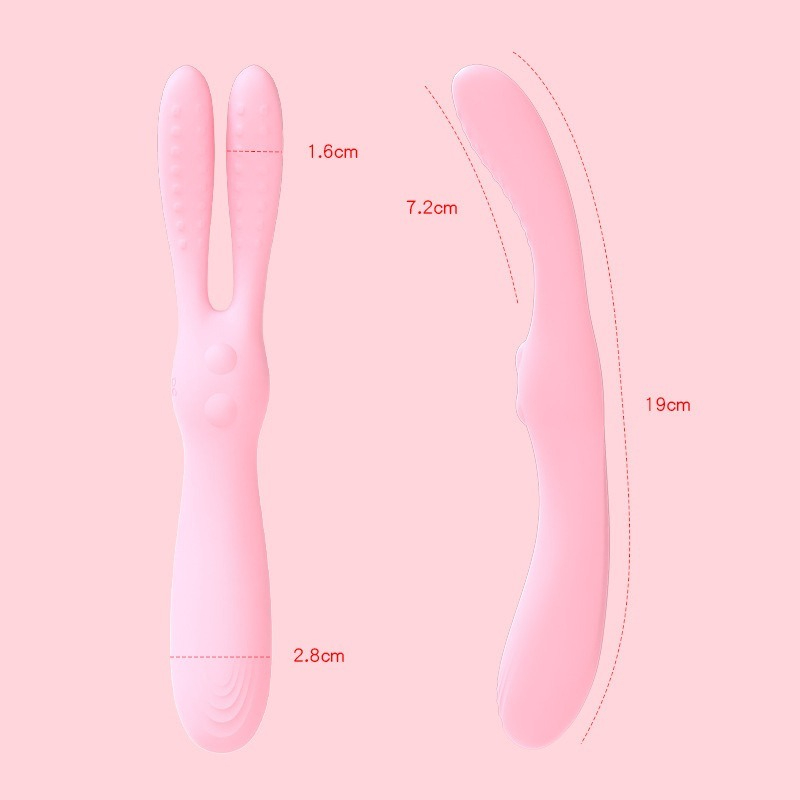 Playful pink rabbit personal massager with textured ears for enhanced pleasure and comfort.