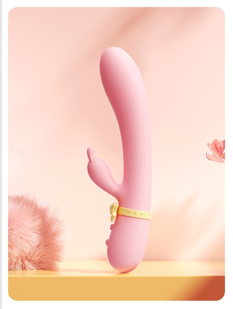 Playful pink modern sex toy design with interactive features and elegant pastel background.