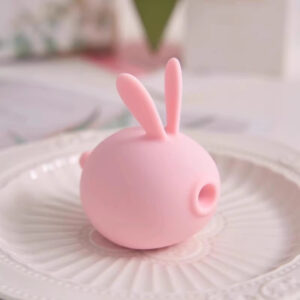 Charming pink silicone rabbit toy, perfect for playful decor and unique gift ideas.