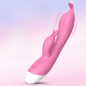 Vibrateur rose vibrant avec oreilles de lapin pour un plaisir accru et un design ergonomique.