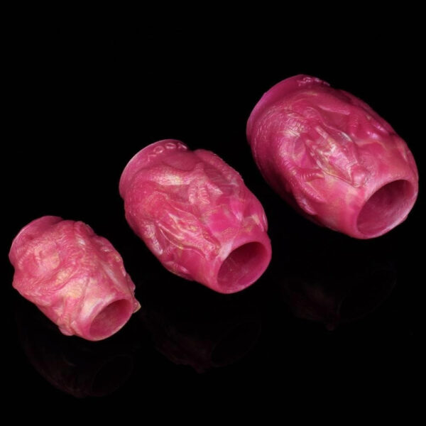 Vibrant pink carved beads, intricately designed for stylish jewelry-making and decorative crafts.