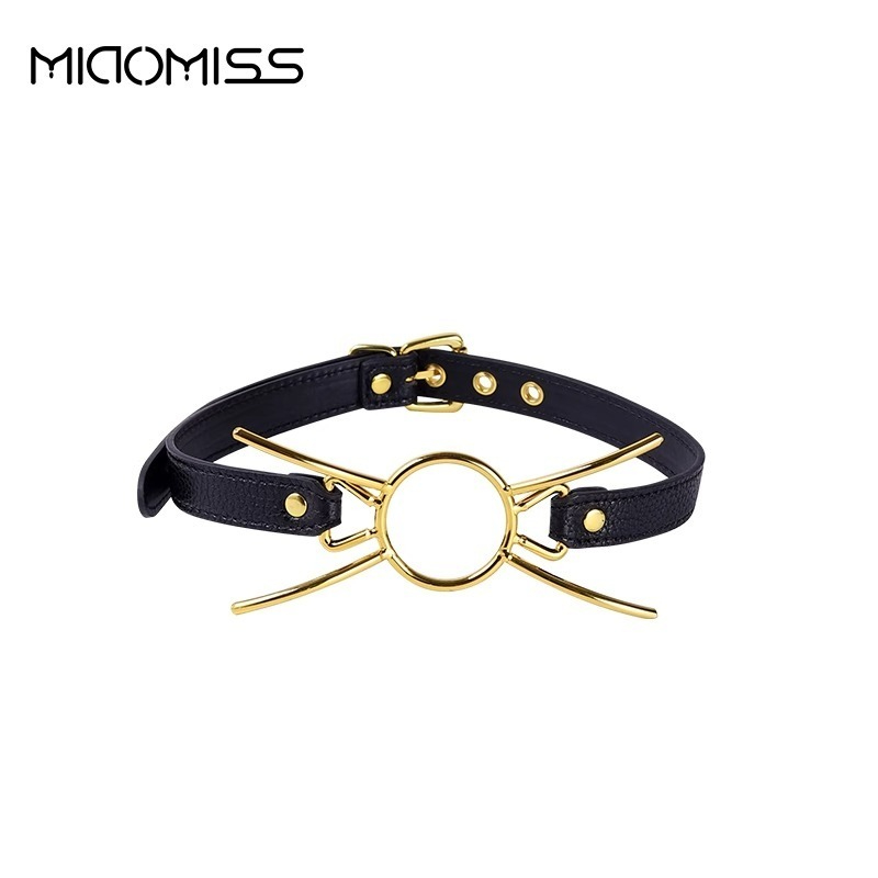 Elegant black leather choker collar with gold accents for stylish and bold accessory choices.