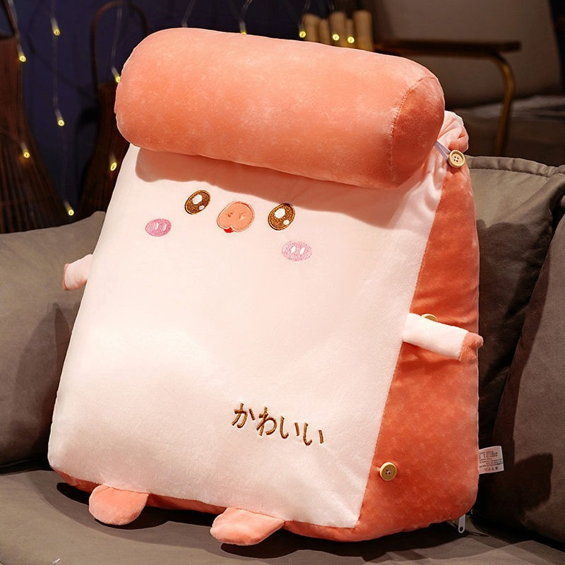 Adorable pink plush cushion featuring a cute animal design, perfect for cozy decor and relaxation.