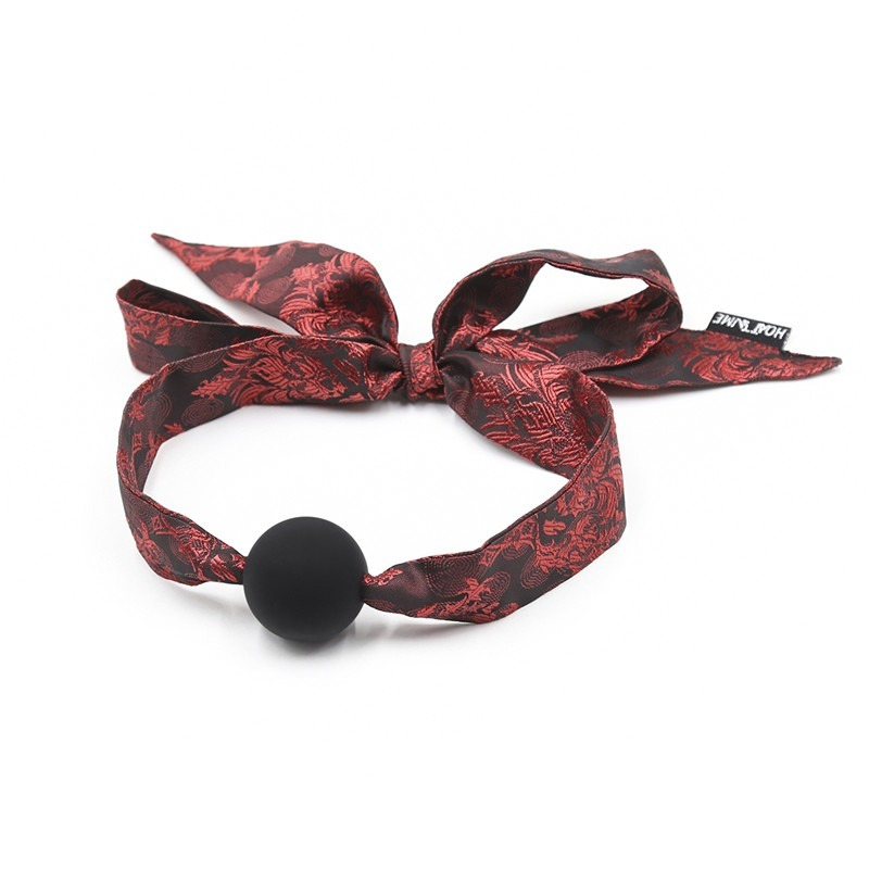 Stylish black and red decorative tie with silicone ball for versatile fashion and fun.