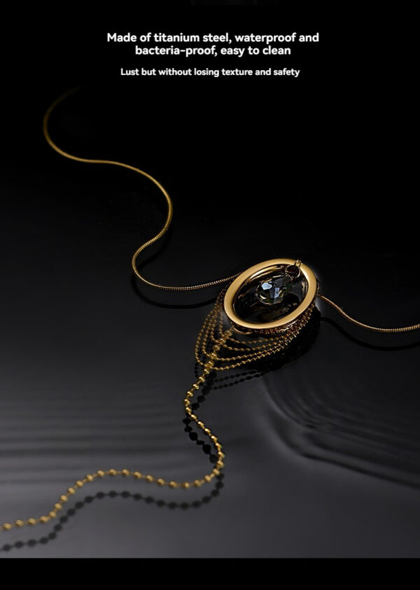 Elegant titanium steel necklace with dark gemstone pendant, perfect for stylish everyday wear.