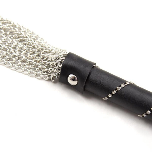 Elegant black handle with shiny metal chains, ideal for versatile enjoyment and pleasure.