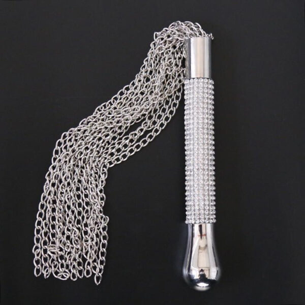 Glamorous metallic handle with sparkling stones and cascading chains, ideal for stylish performance accessories.