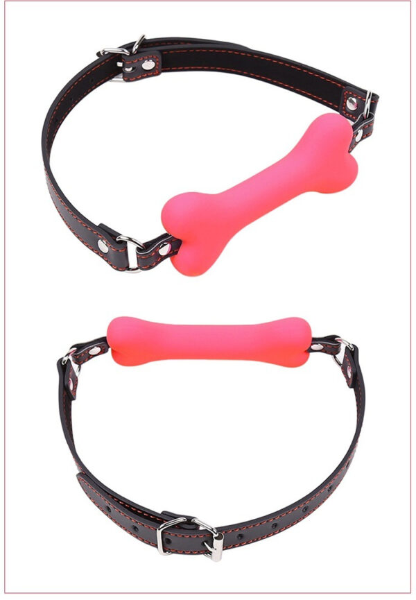 Durable black dog collar with a pink rubber bone accessory for playful pet styling.