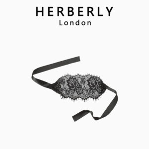 Elegant black lace eye mask by HERBERLY London, perfect for sophisticated lingerie lovers.