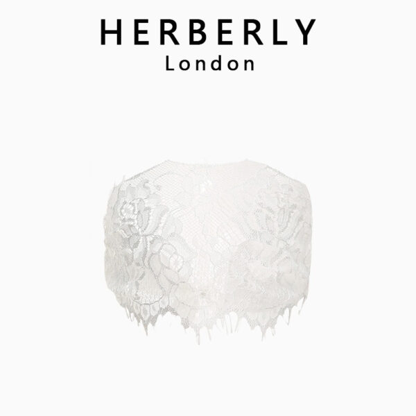 Elegant HERBERLY London lace cropped top for a feminine and sophisticated look.