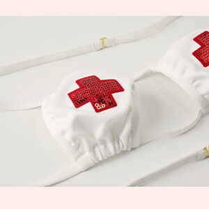 White bikini top with red cross details for trendy summer beachwear and pool parties.