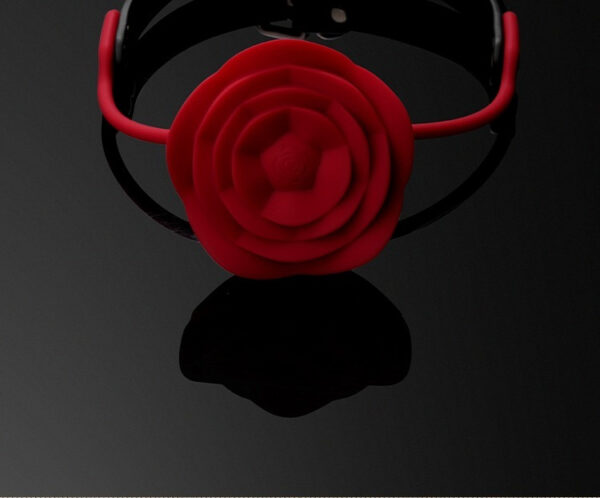 Vibrant red rose headband accessory for unique style and bold fashion statements.