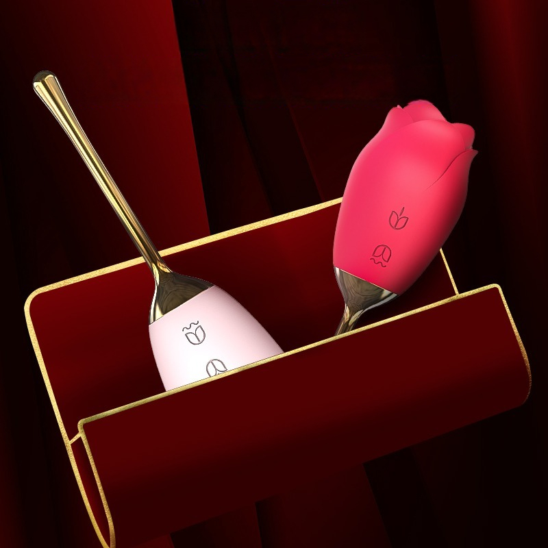 Elegant red-themed utensils in a luxurious gold box, perfect for romantic moments.