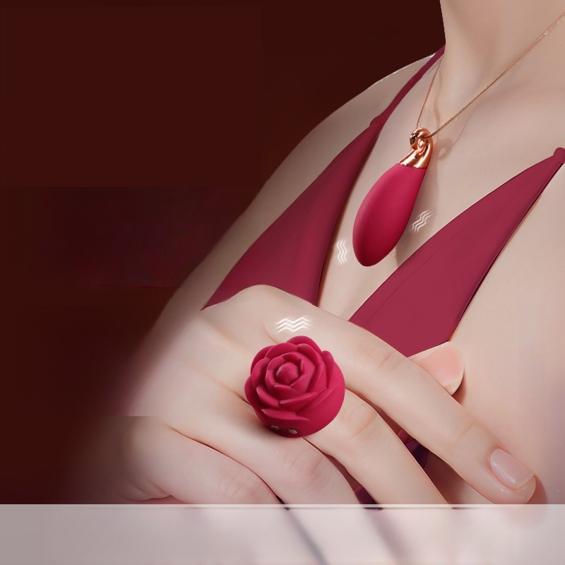 Elegant red rose ring and teardrop necklace for a bold, romantic look.